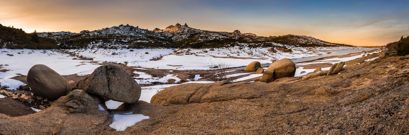 Sunrise in Penhas Douradas, Serra da Estrela Natural Park, Portugal Panoramic photo of 14 vertical images blended in photoshop.